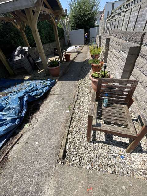 Patio cleared, furniture back in place, waste bagged for removal